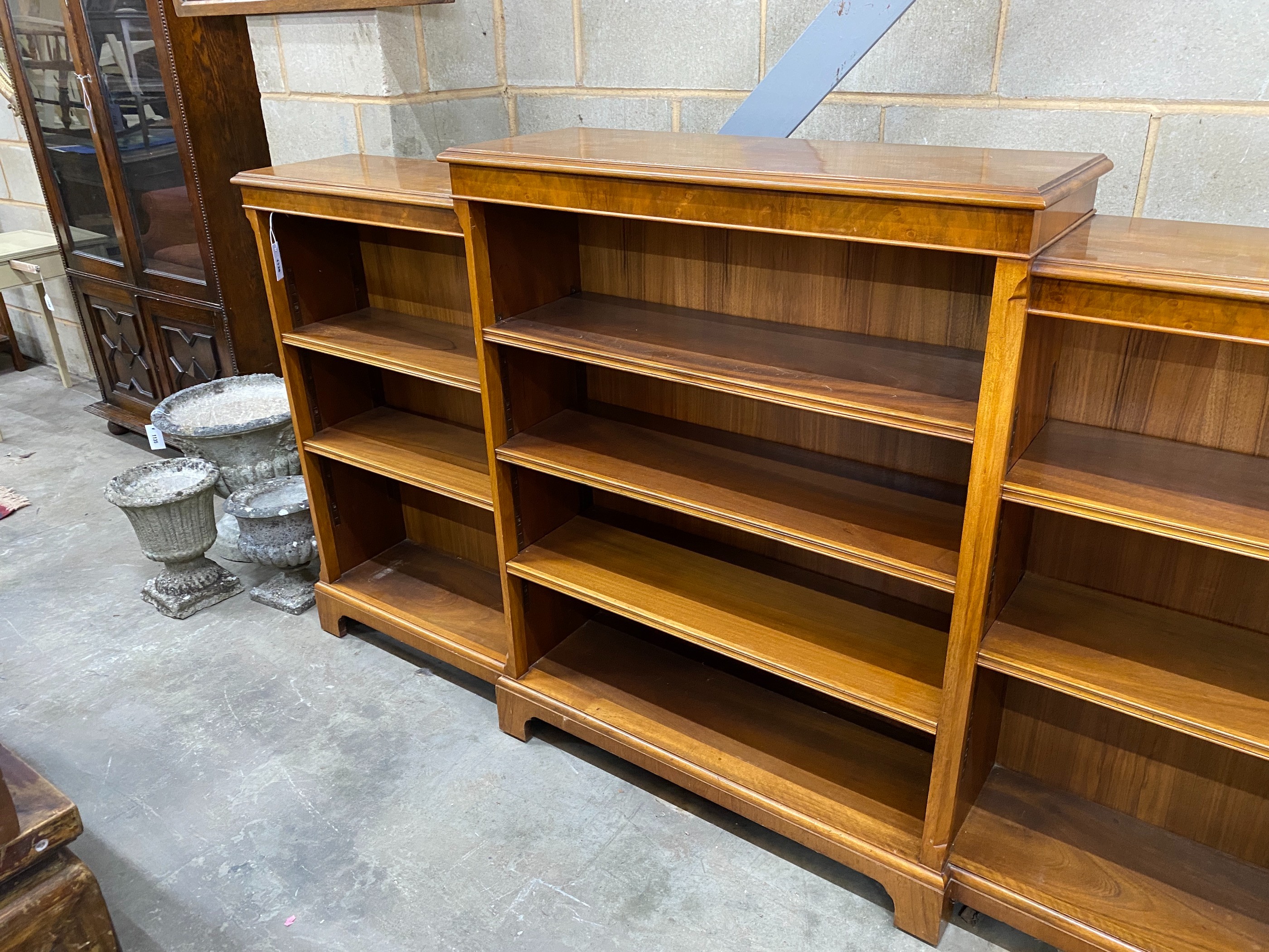 A mahogany open dwarf breakfront bookcase, width 213cm, depth 33cm, height 115cm